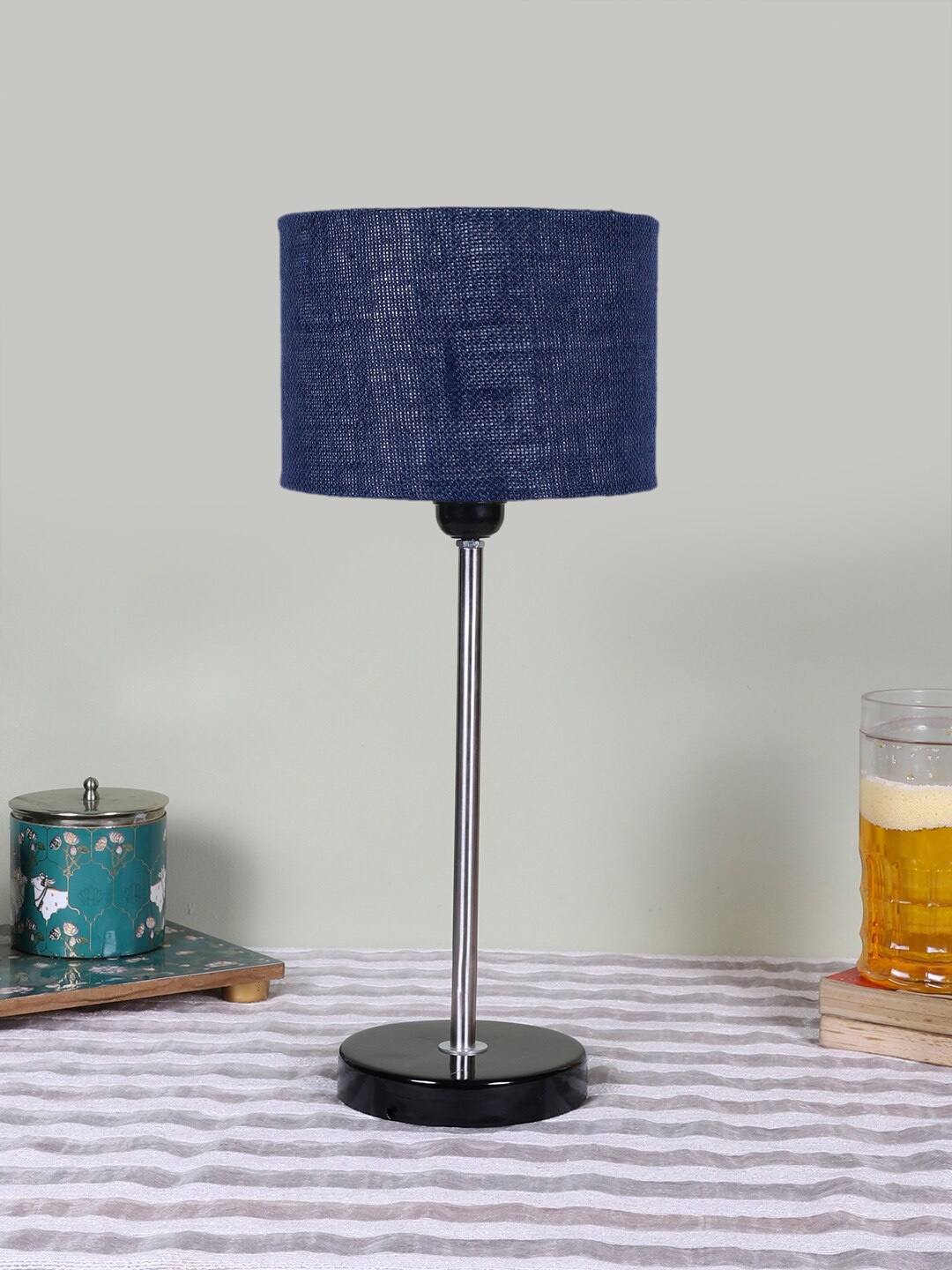 

Devansh Blue Textured Jute Cylindrical Table Lamp