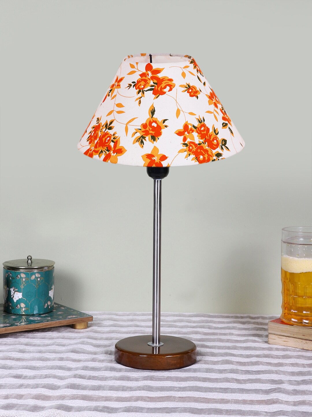 

Devansh White Printed Wooden Contemporary Frustum Shaped Table Lamp
