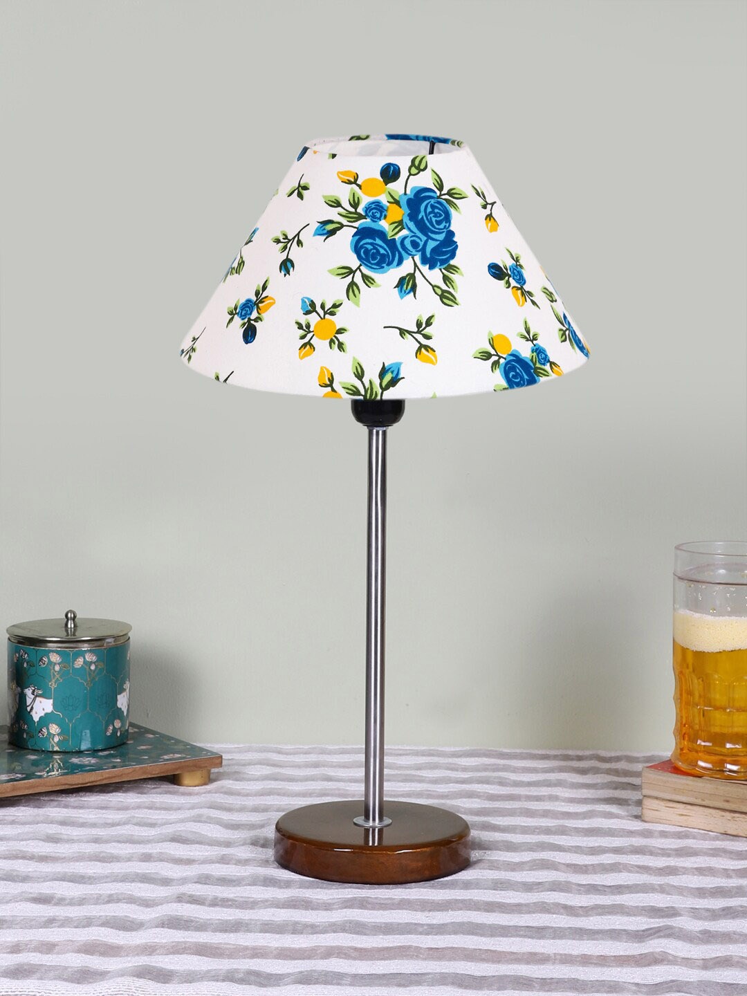 

Devansh White Printed Wooden Contemporary Frustum Shaped Table Lamp