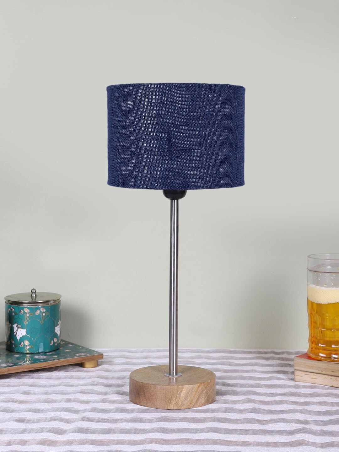 

Devansh Blue Textured Wooden Contemporary Cylindrical Shaped Table Lamp