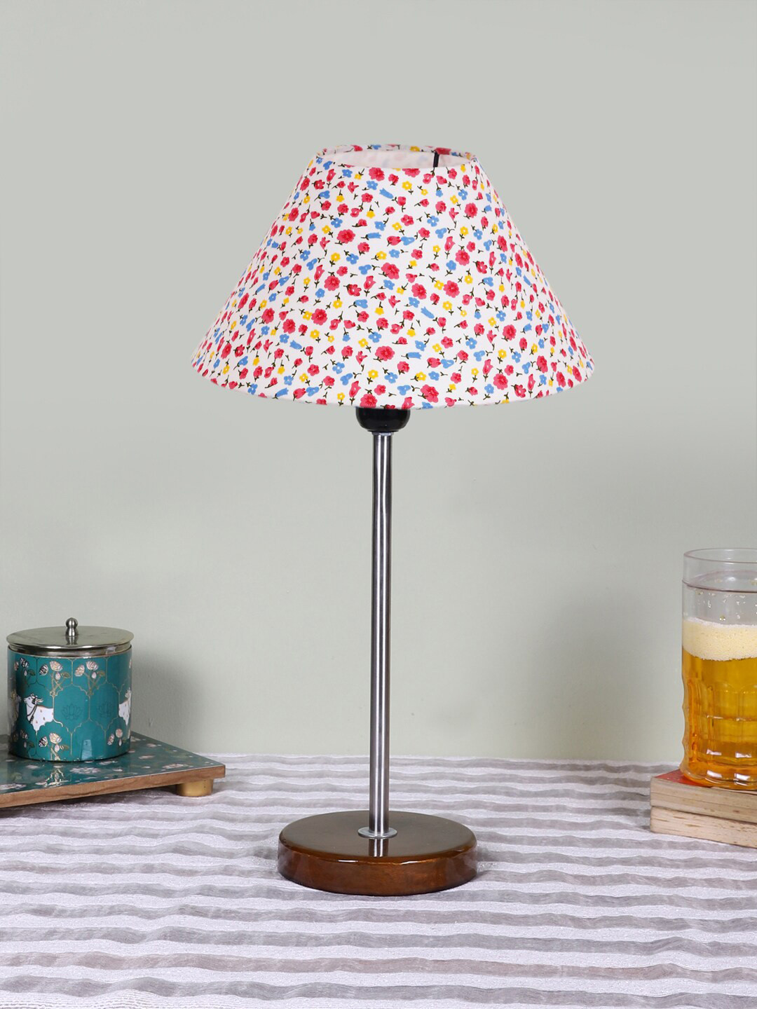 

Devansh White Printed Wooden Contemporary Frustum Shaped Table Lamp