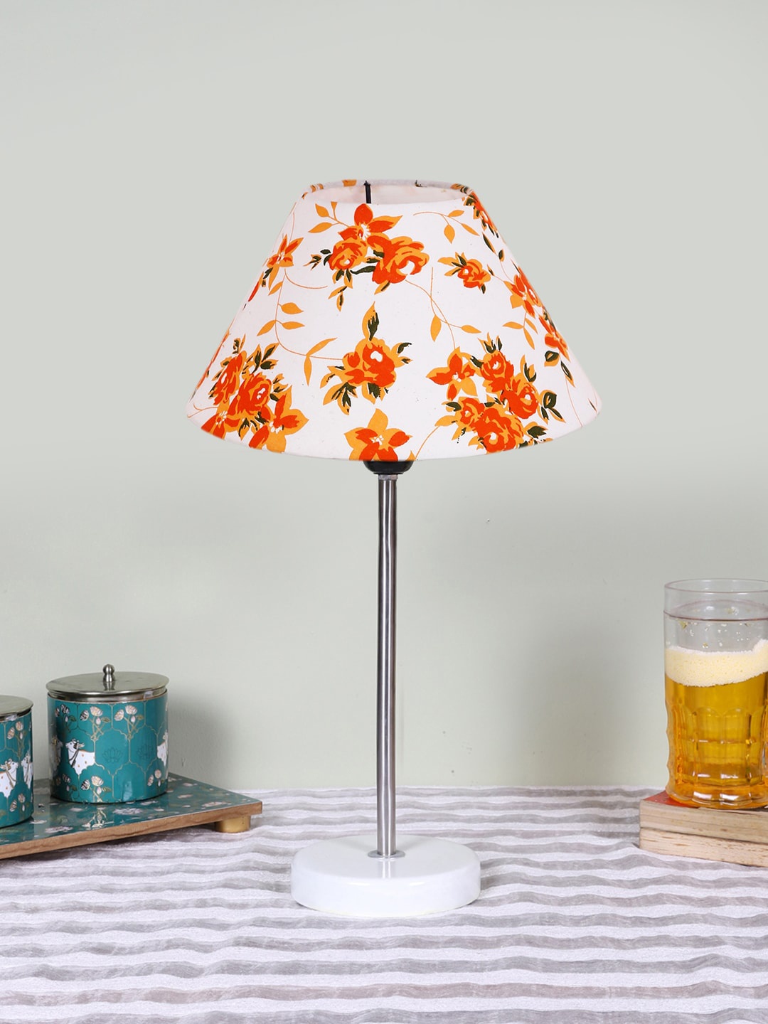 

Devansh White Printed Wooden Contemporary Frustum Shaped Table Lamp