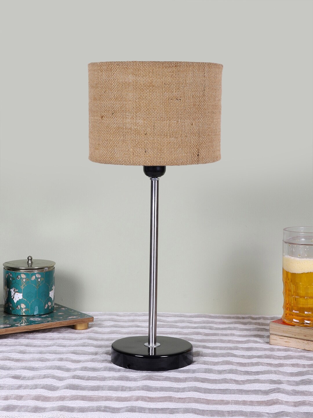 

Devansh Beige Textured Wooden Contemporary Cylindrical Shaped Table Lamp
