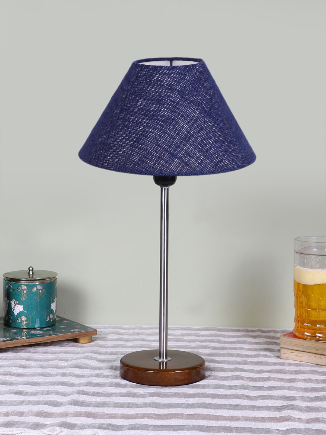 

Devansh Blue Textured Frustum Shaped Wooden Contemporary Table Lamp