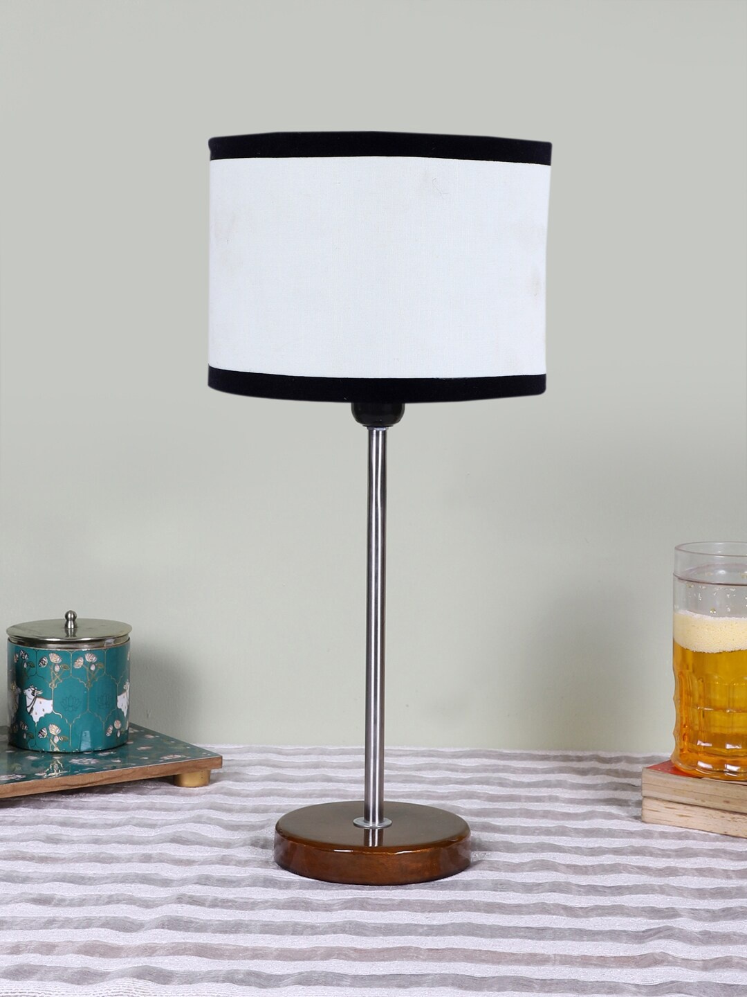 

Devansh White Textured Wooden Contemporary Cylindrical Shaped Table Lamp