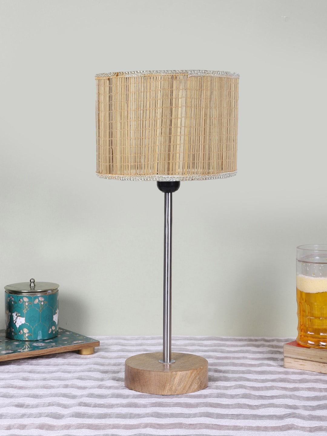 

Devansh Beige Textured Wooden Contemporary Cylindrical Shaped Table Lamp