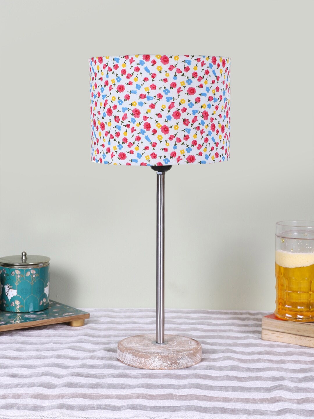 

Devansh White Printed Wooden Contemporary Cylindrical Shaped Table Lamp