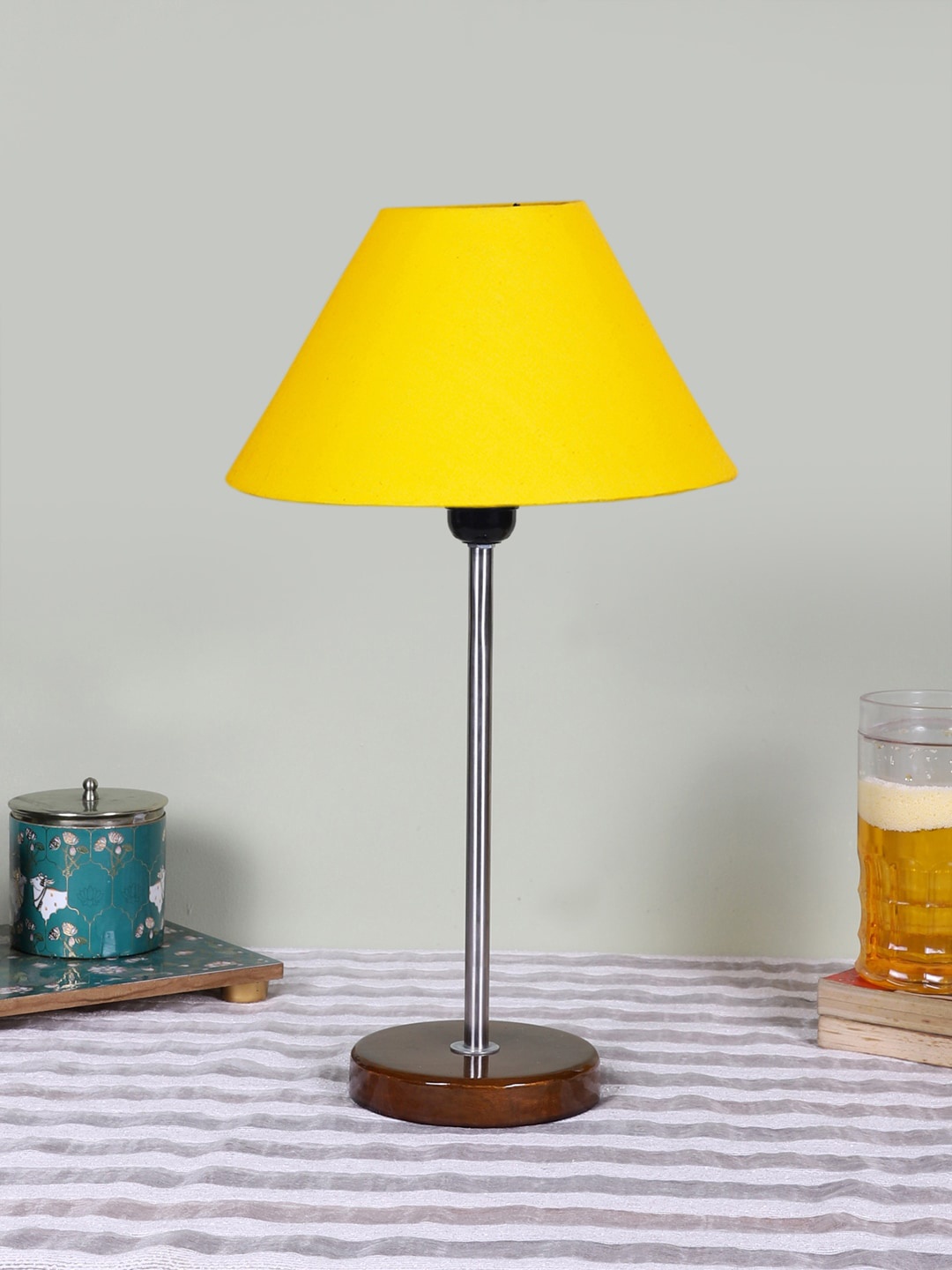 

Devansh Yellow Textured Wooden Contemporary Frustum Shaped Table Lamp