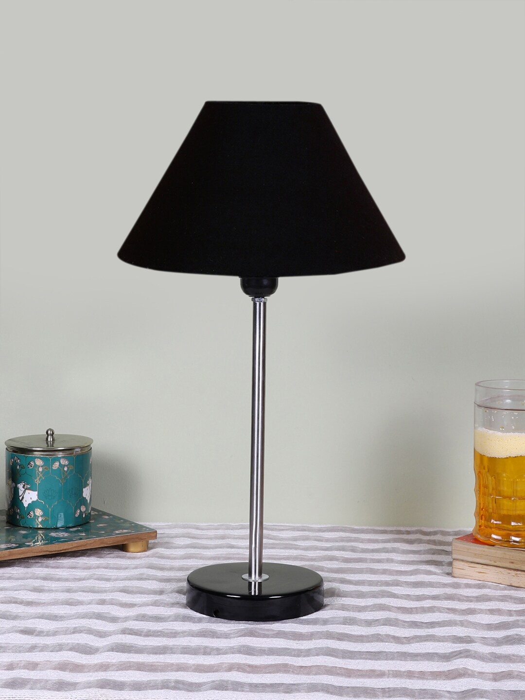

Devansh Black Textured Wooden Contemporary Frustum Shaped Table Lamp