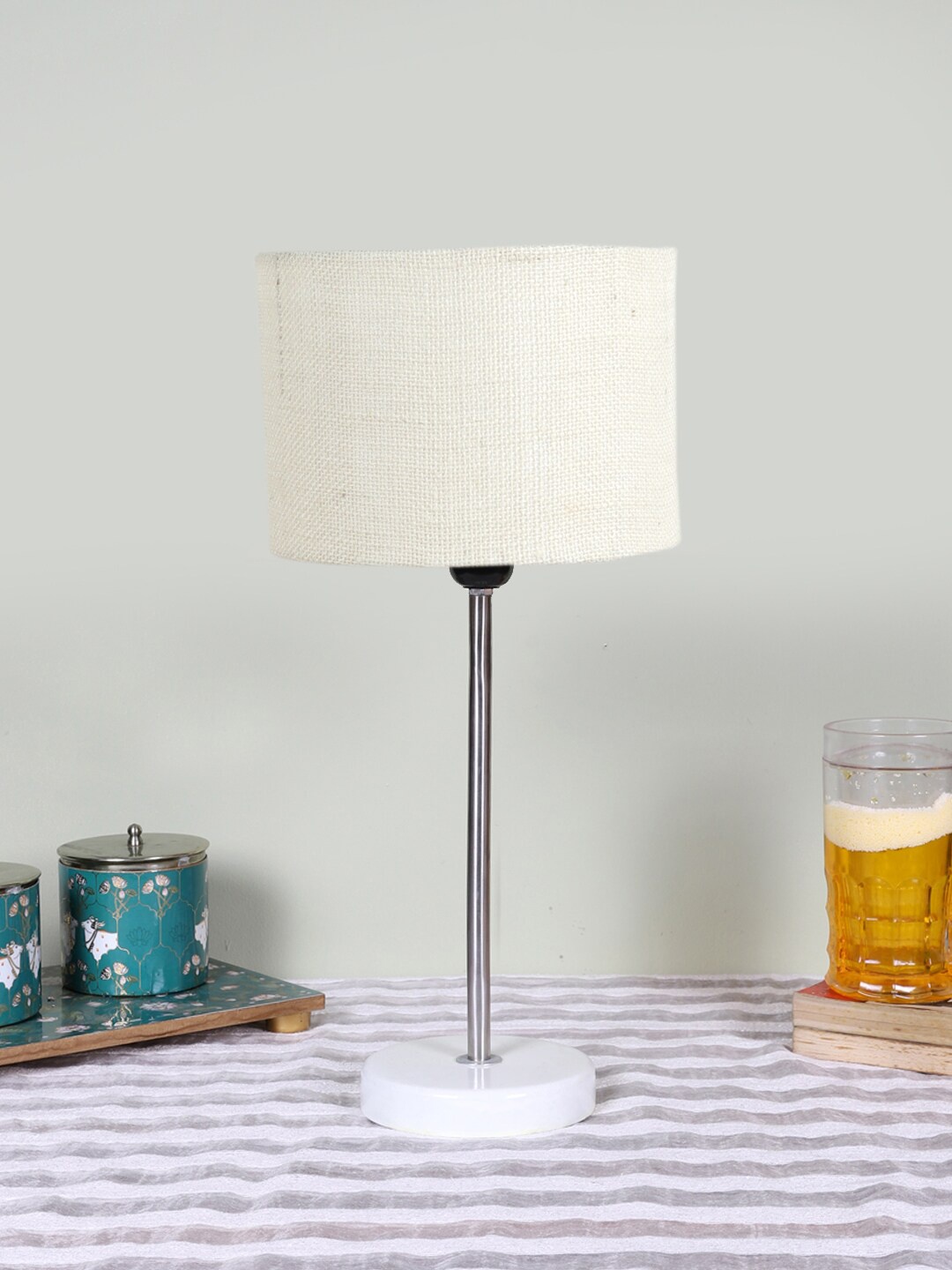 

Devansh White Textured Wooden Contemporary Cylindrical Shaped Table Lamp