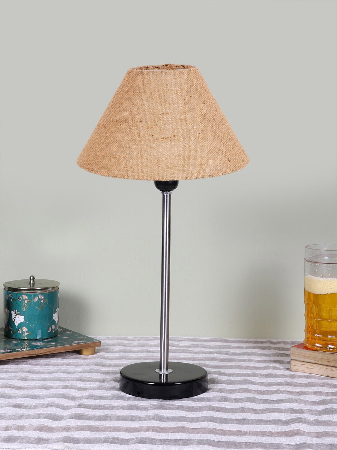 

Devansh Beige Textured Wood Contemporary Frusturical Shaped Table Lamp