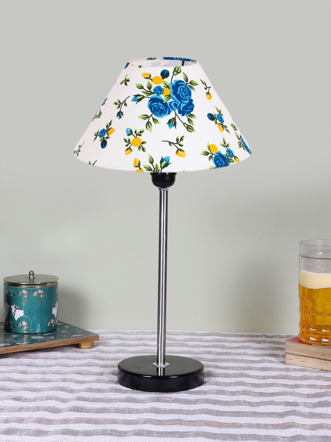 

Devansh White Printed Wooden Contemporary Frustum Shaped Table Lamp