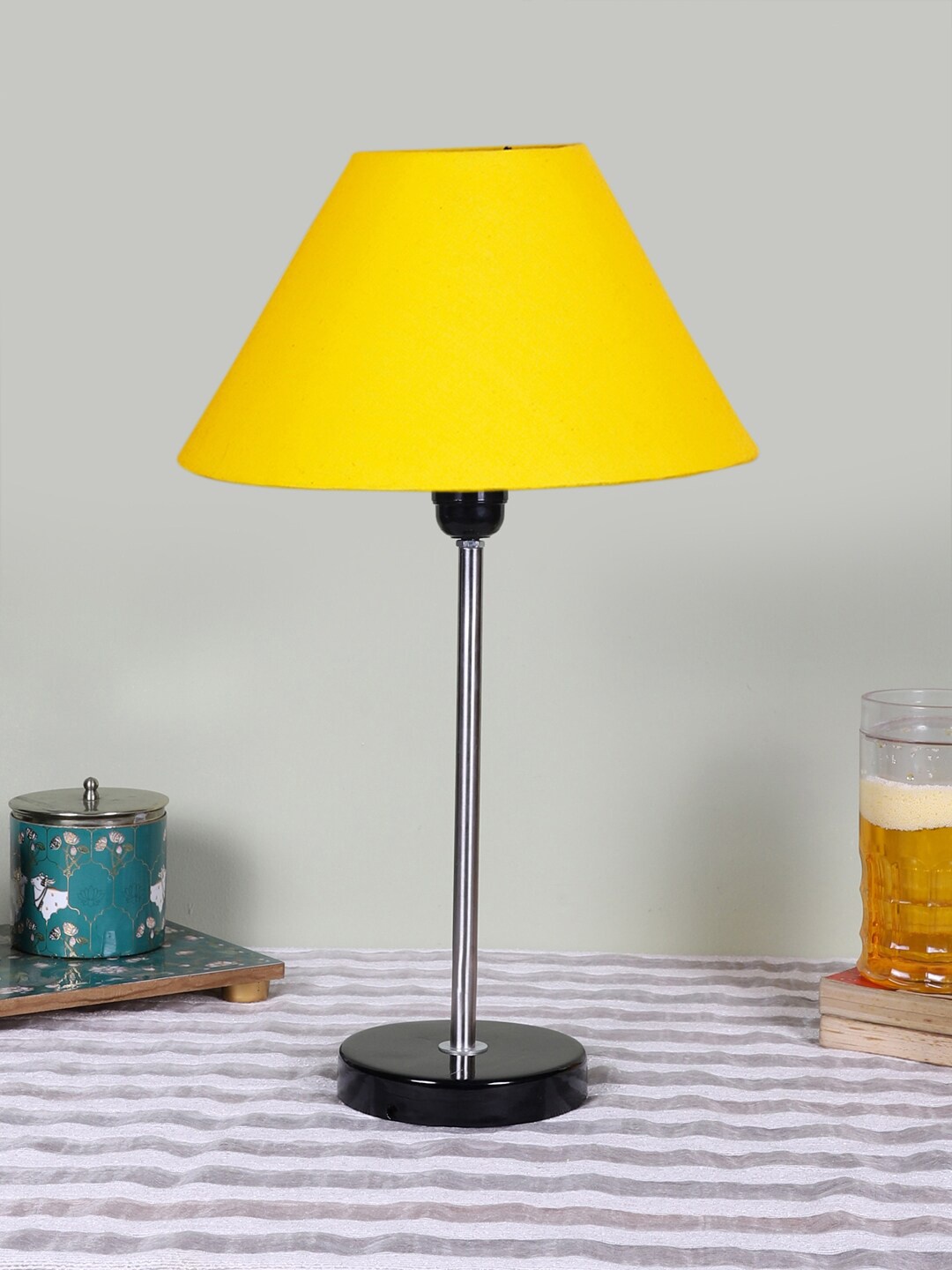 

Devansh Yellow Textured Wooden Contemporary Frustum Shaped Table Lamp