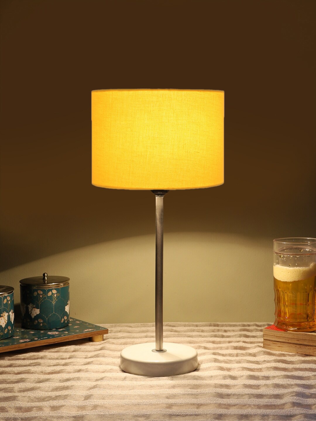 

Devansh Yellow Textured Wooden Contemporary Cylindrical Shaped Table Lamp