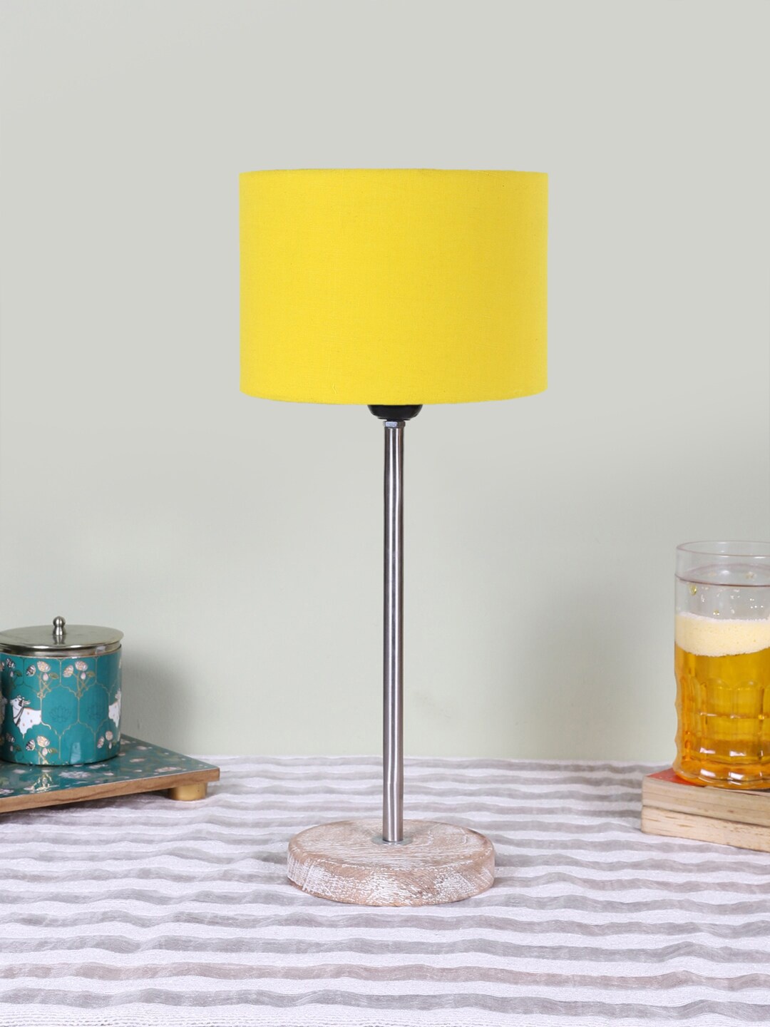 

Devansh Yellow Wooden & Cotton Cylinder Contemporary Table Lamp