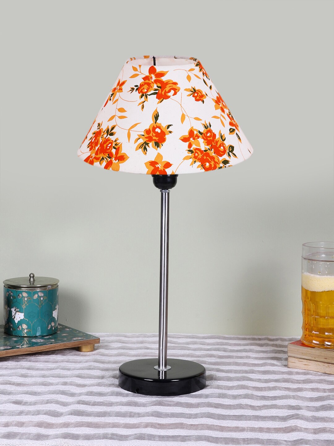 

Devansh White Printed Wooden & Cotton Frustum Contemporary Table Lamp