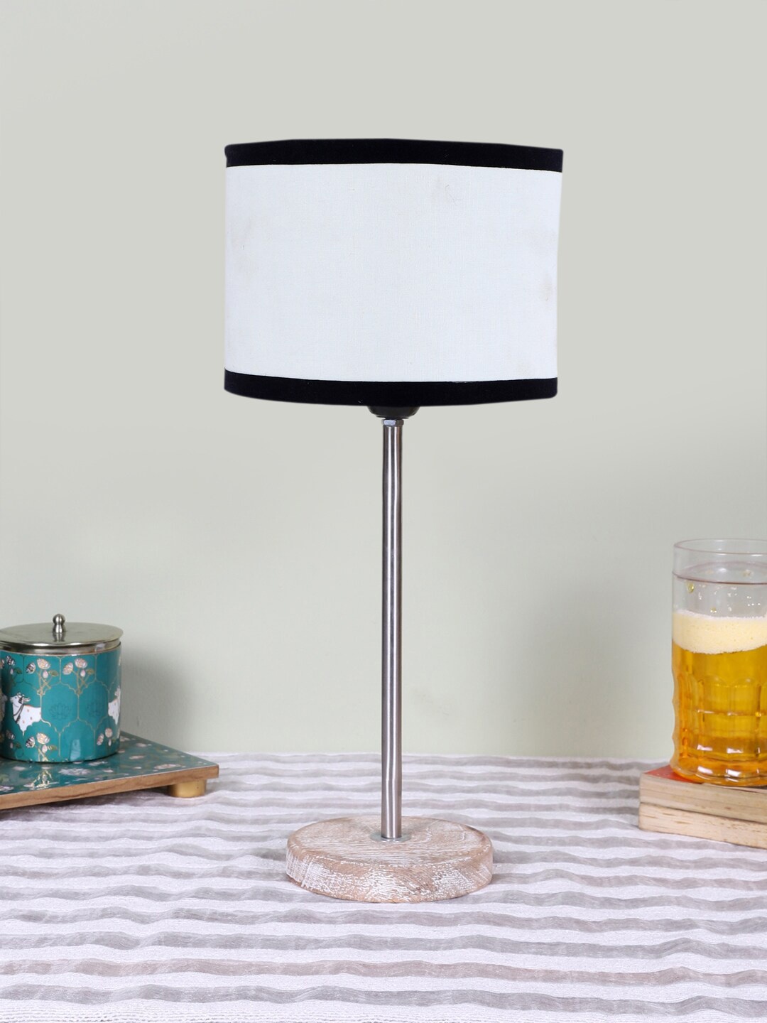 

Devansh White Wooden & Cotton Cylinder Contemporary Table Lamp