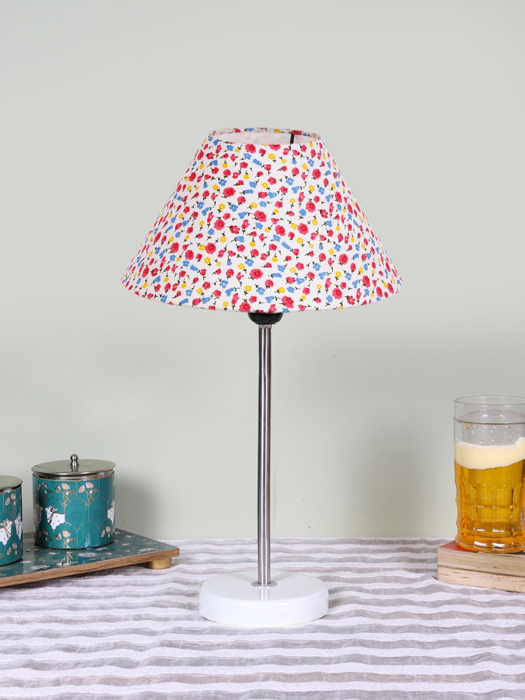 

Devansh White Printed Wooden & Cotton Frustum Contemporary Table Lamp