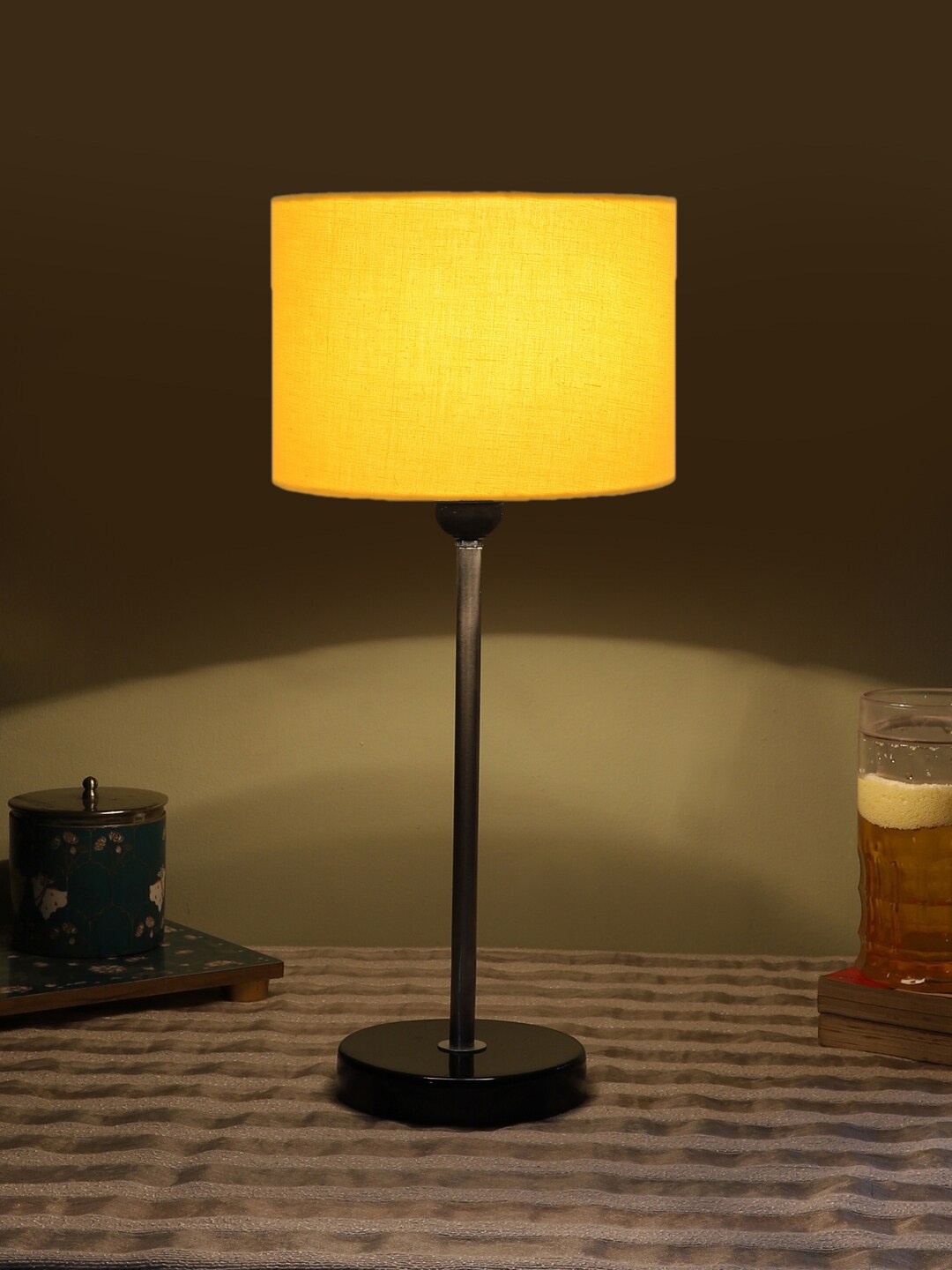 

Devansh Yellow Wooden & Cotton Cylinder Contemporary Table Lamp