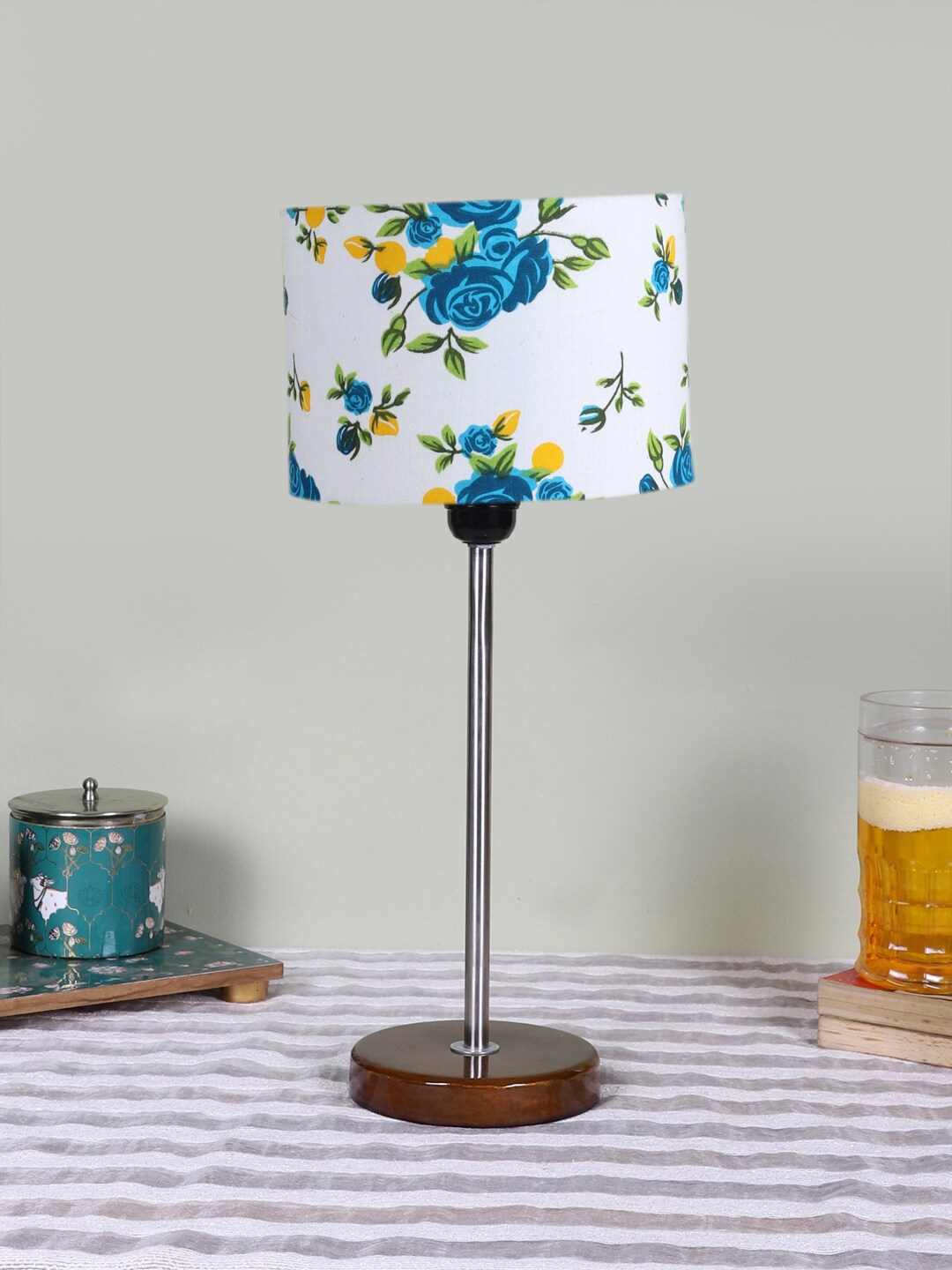 

Devansh White Printed Wood & Cotton Cylinder Contemporary Table Lamp