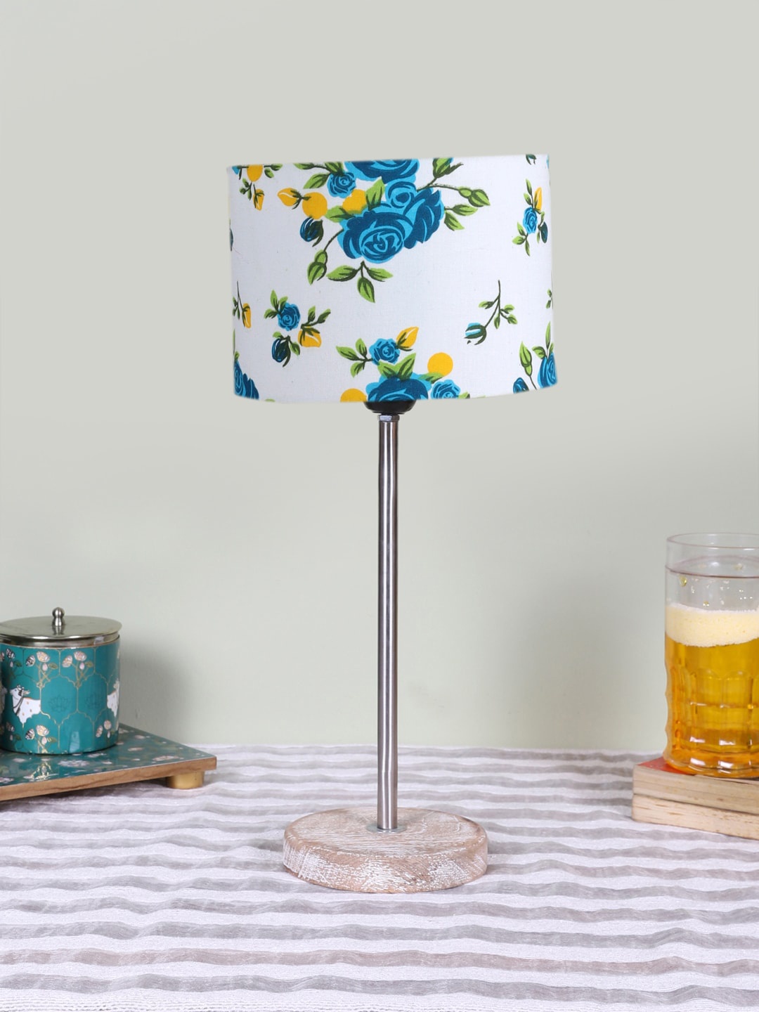 

Devansh White Printed Wood & Cotton Cylinder Contemporary Table Lamp