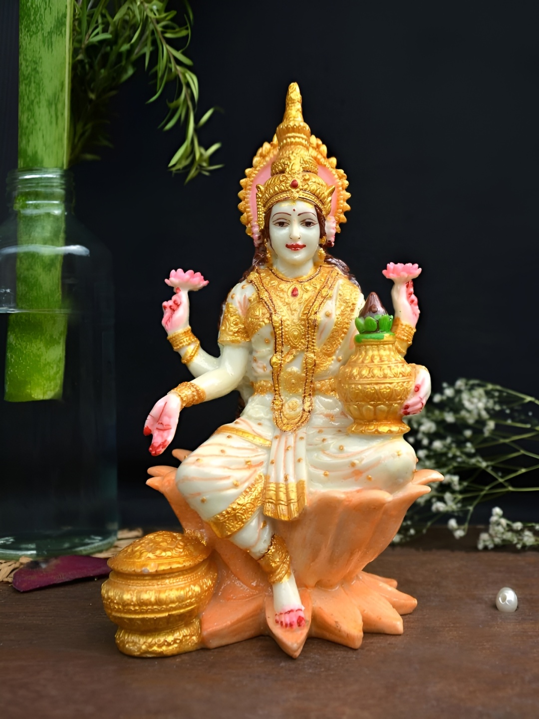 

krishnagallery1 Beige & Gold Toned Laxmi Mata Murti Showpiece