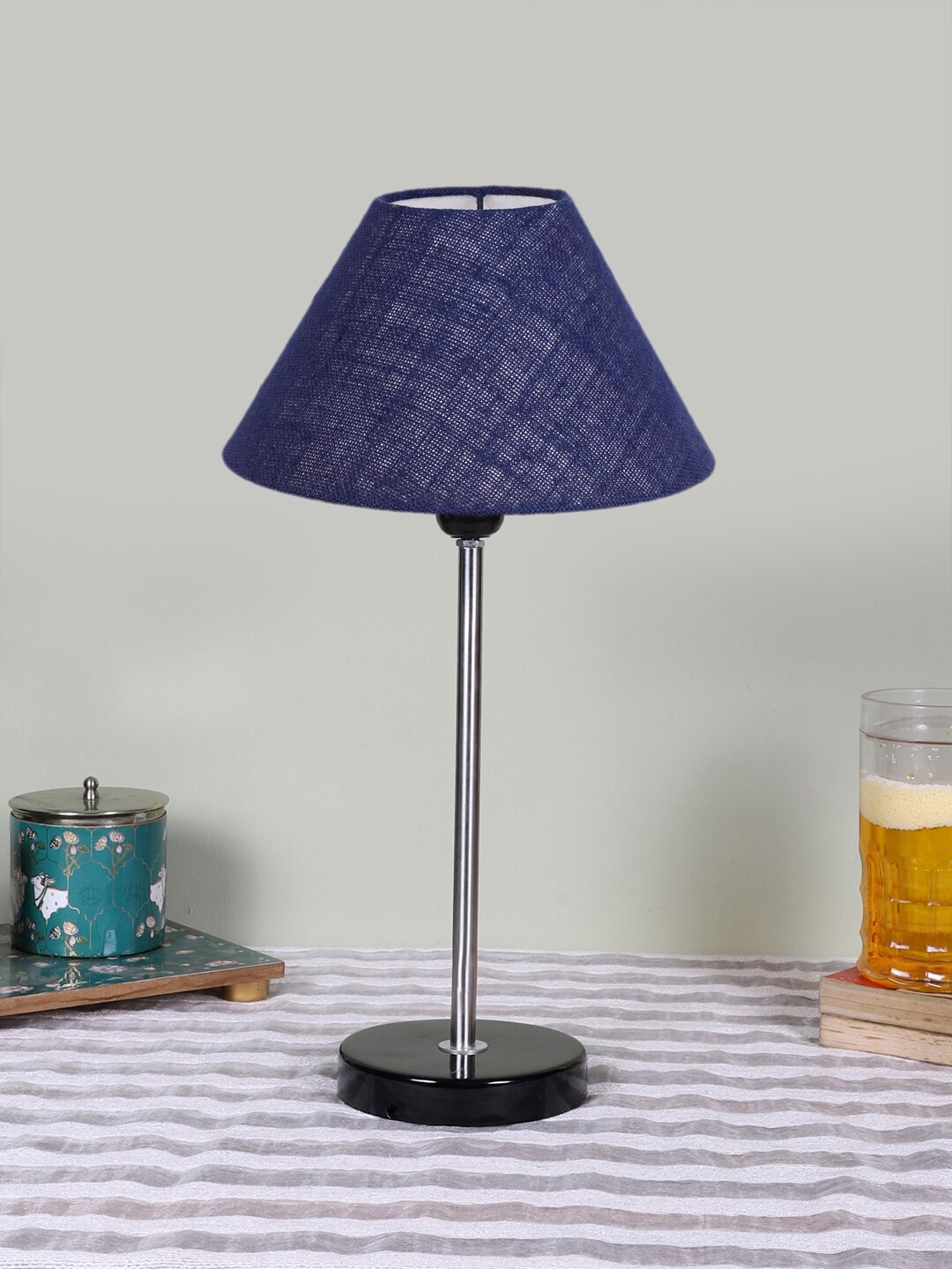 

Devansh Blue Wooden Frustum Shaped Contemporary Table Lamp