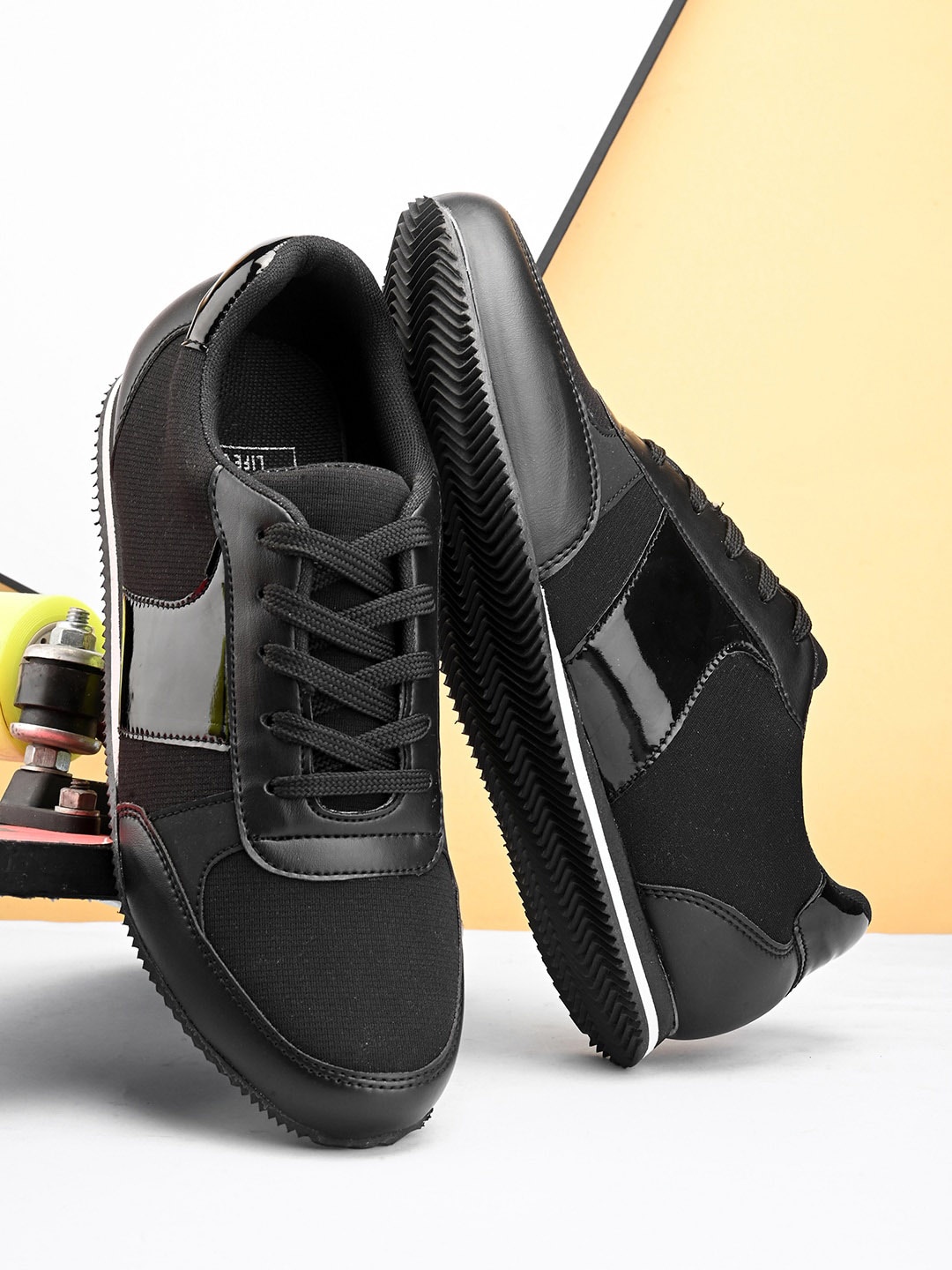

The Roadster Lifestyle Co. Men Black Textured Comfort Insole Lace-Up Sneakers