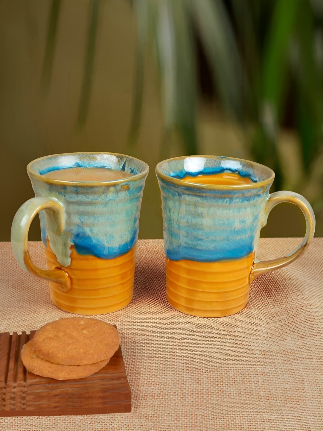 

StyleMyWay Teal & Brown 2 Pieces Printed Ceramic Glossy Mugs 300 ml