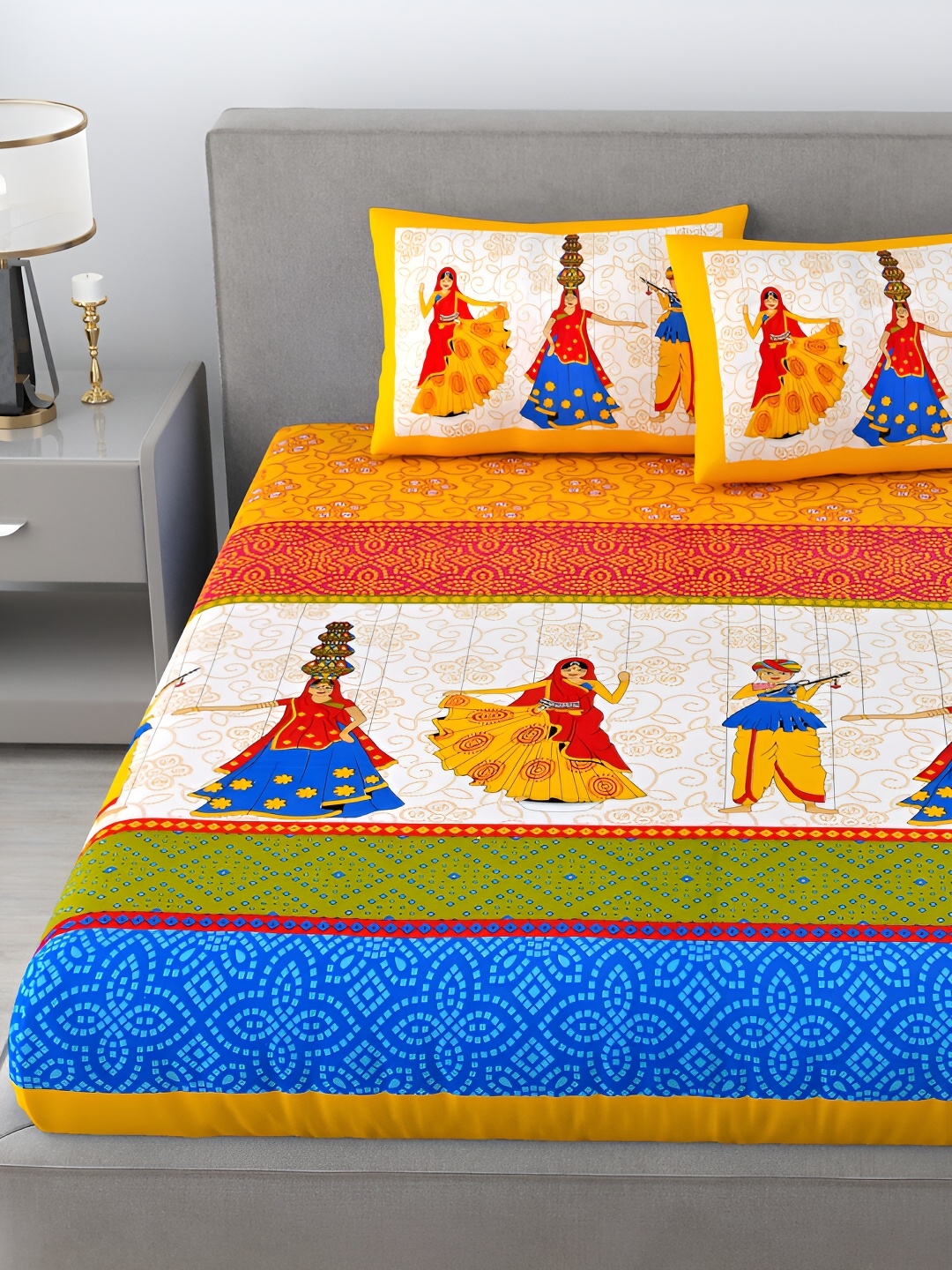 

Aura Yellow & Blue Ethnic Motifs 144 TC Cotton Queen Bedsheet with 2 Pillow Covers