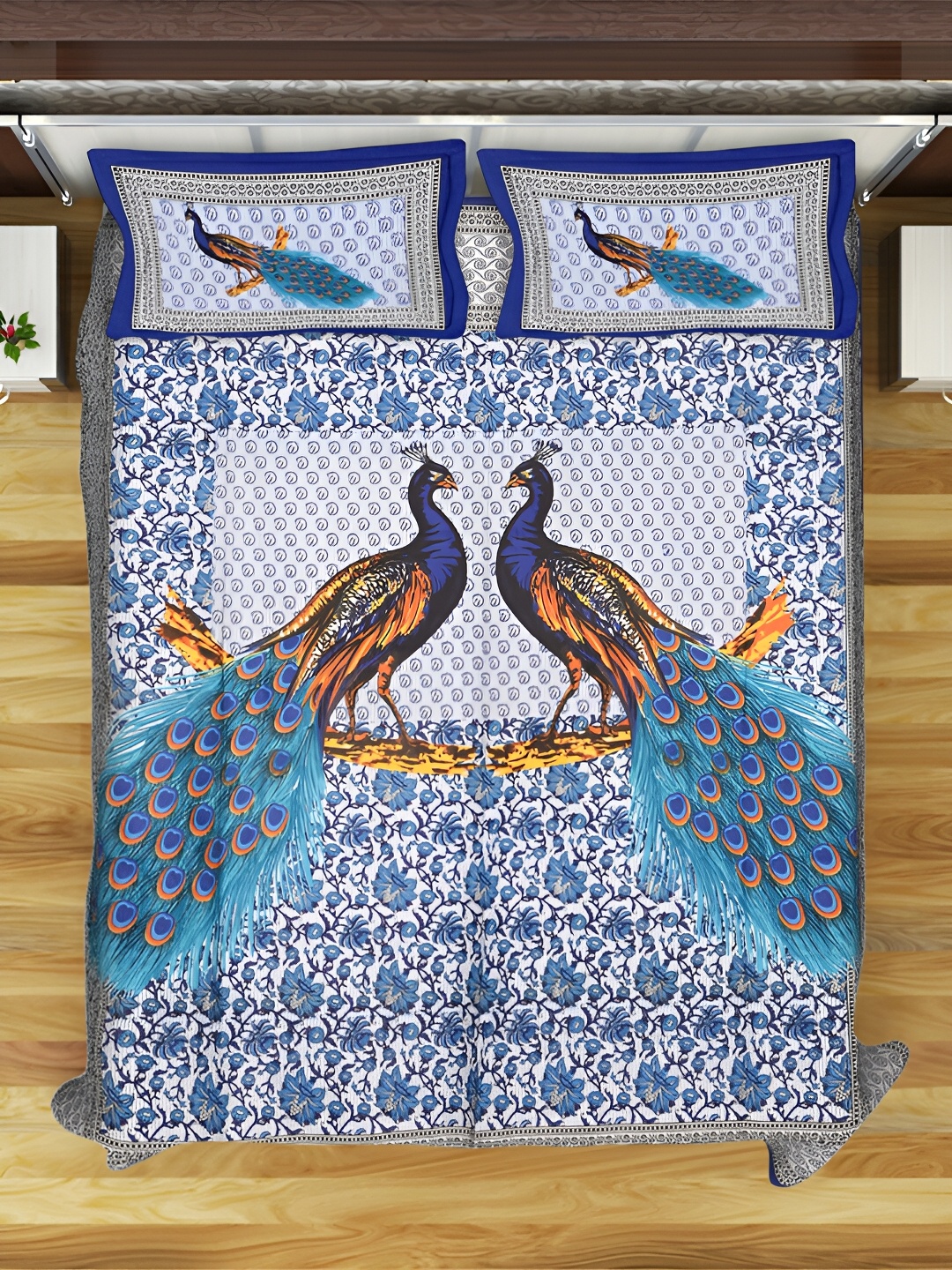 

POORAK Blue & Mustard Peacock Printed 104 TC Cotton Queen Bedsheet With 2 Pillow Covers