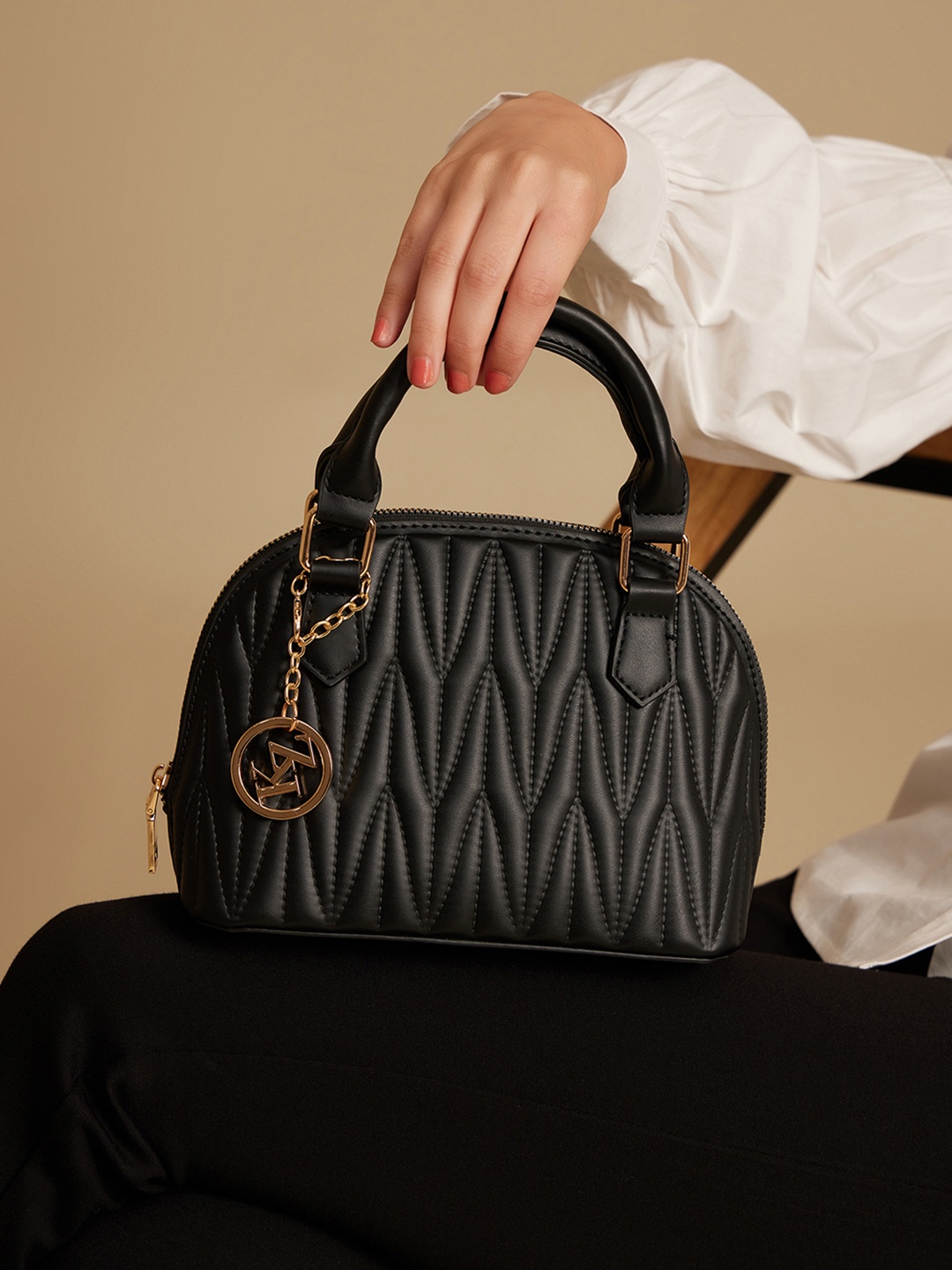 

Kazo Quilted Small Solid Sling Bag, Black