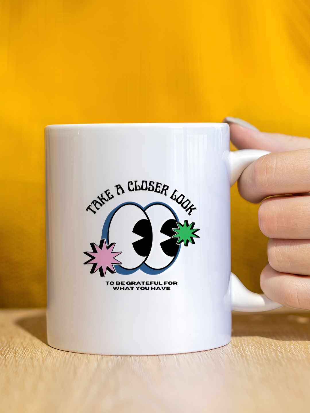 

The Decor Lane White & Black Printed Ceramic Glossy Mug 325 ml