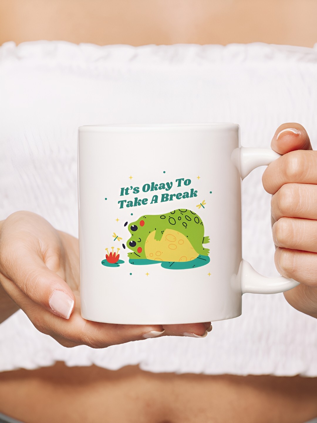 

The Decor Lane White & Green Printed Ceramic Glossy Mug 325 ml