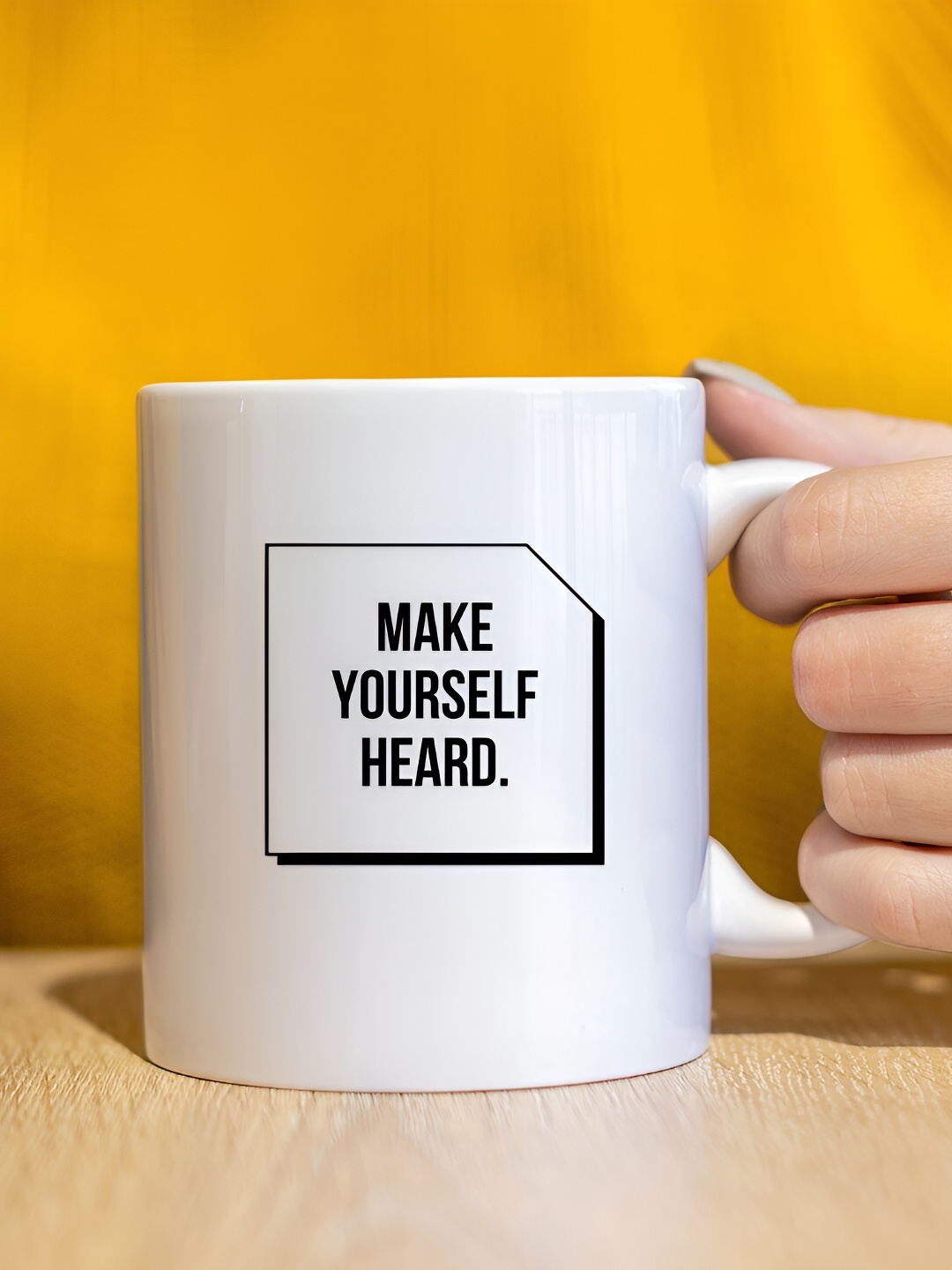 

The Decor Lane White & Black Printed Ceramic Glossy Mug 325 ml