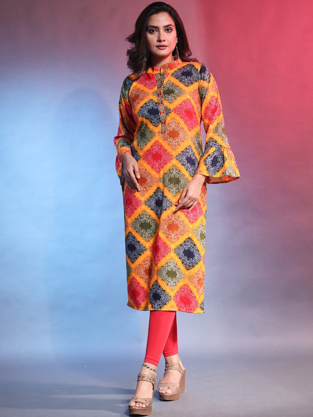 

Charukriti Ethnic Motifs Printed Bell Sleeves Kurta, Orange