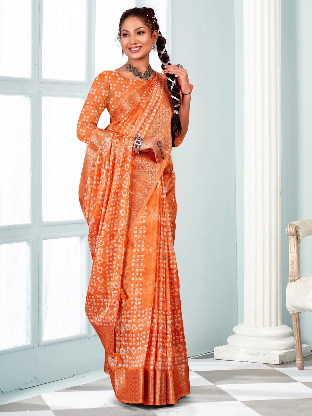 

Mitera Orange & White Ethnic Motifs Zari Jute Silk Sungudi Saree