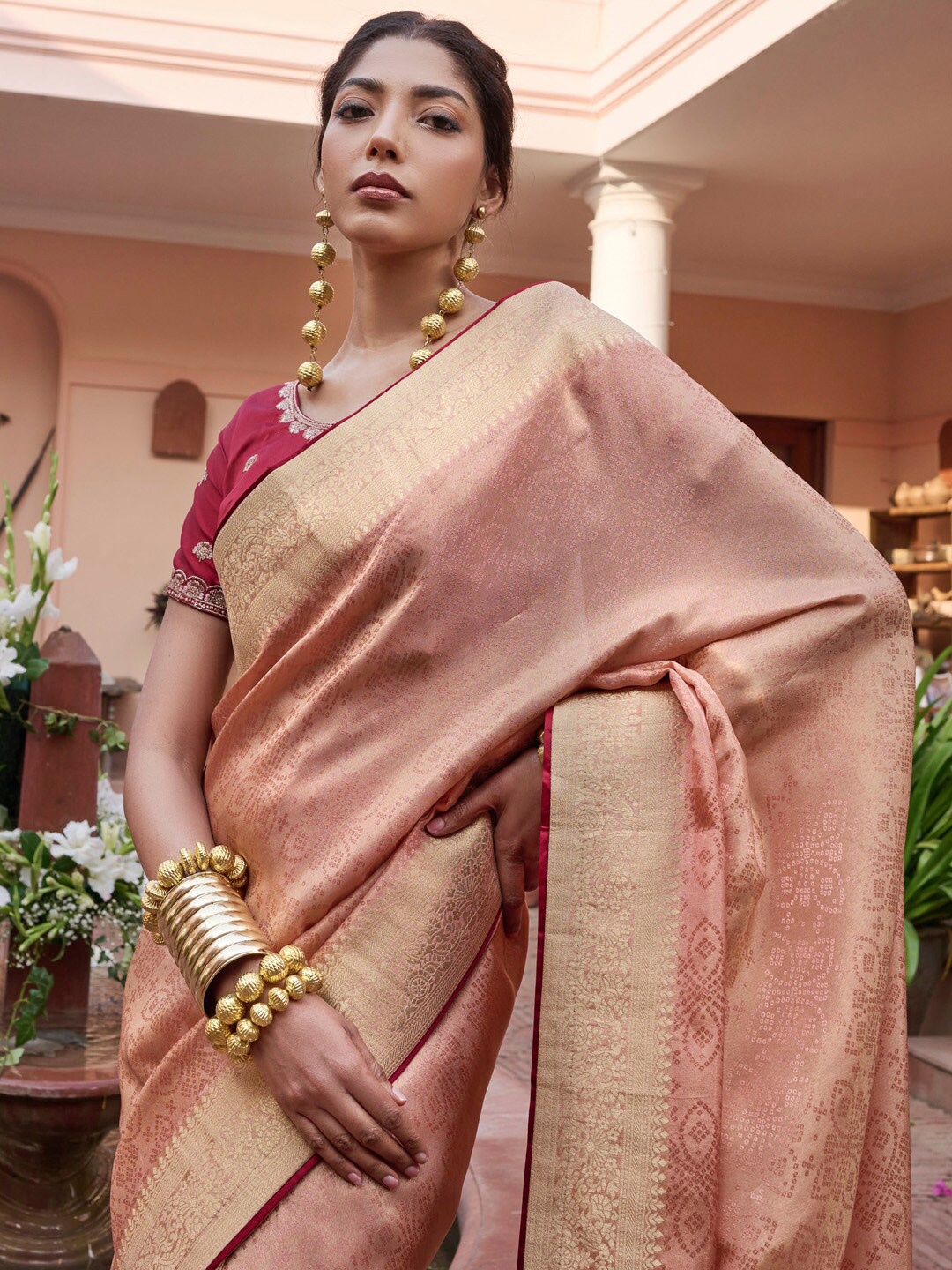 

Mitera Peach & Gold toned Woven Design Zari Banarasi Saree