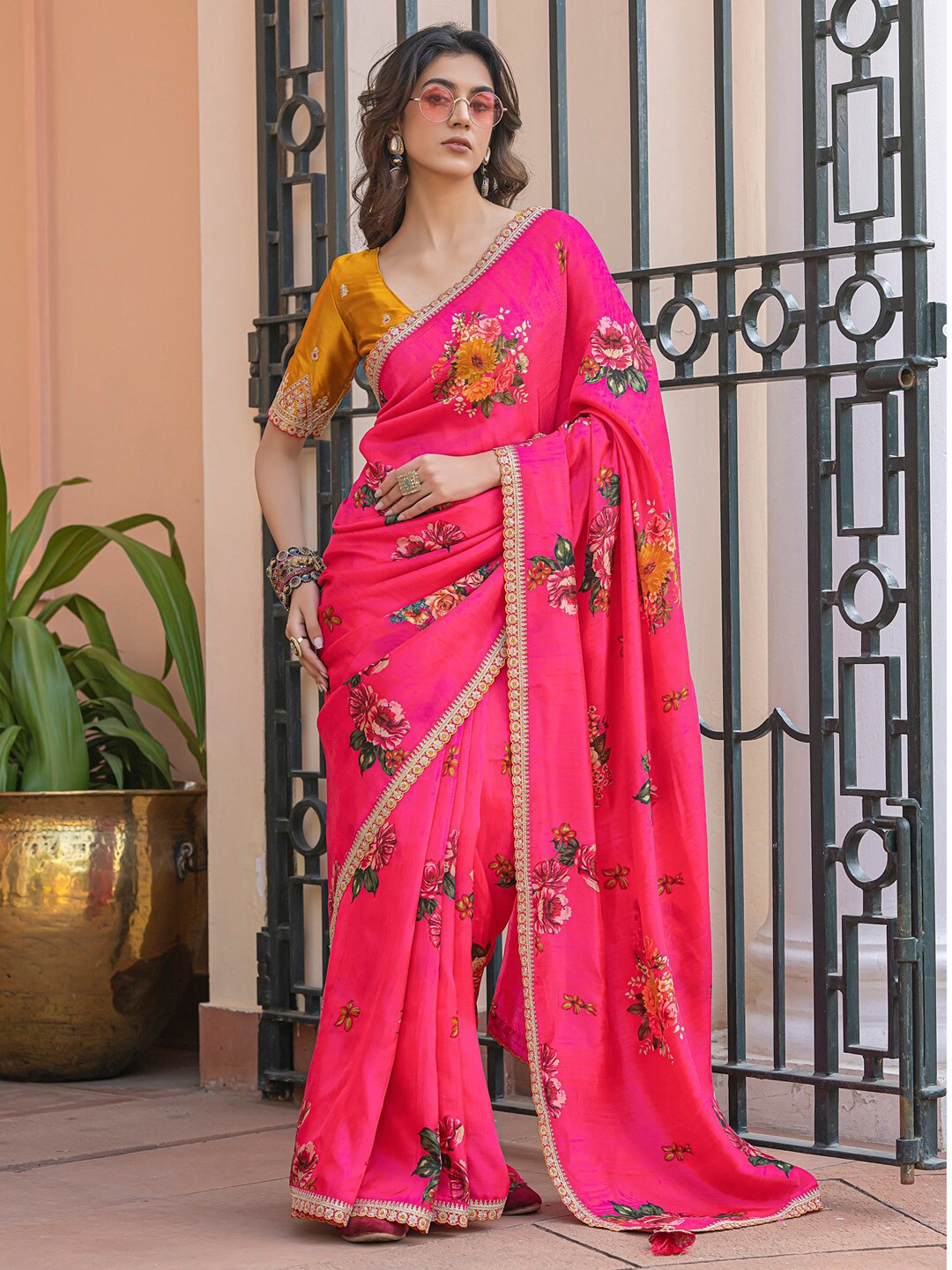 

Mitera Pink & Gold toned Floral Embroidered Saree