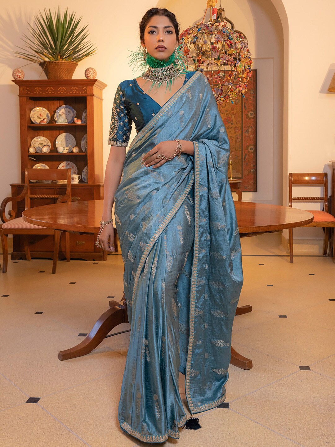 

Mitera Blue & Gold toned Ethnic Motifs Sequinned Saree