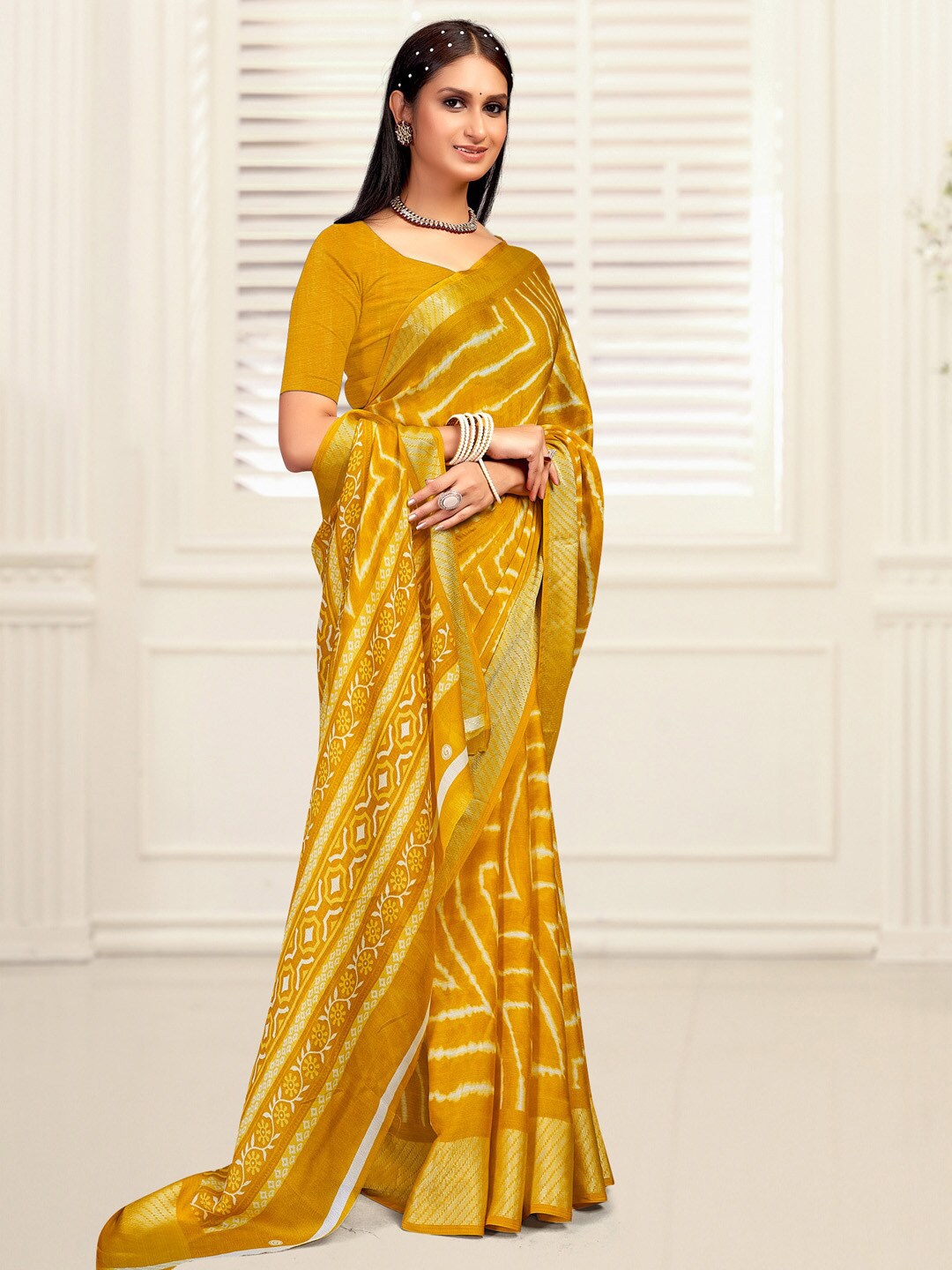 

Mitera Geometric Printed Zari Poly Georgette Sungudi Saree, Mustard
