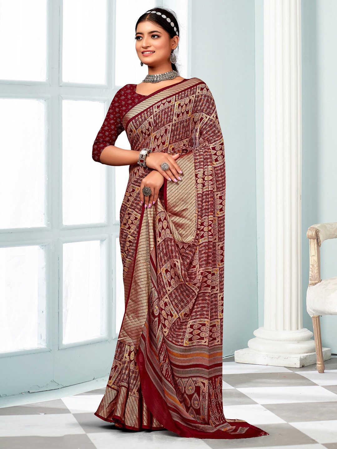 

Mitera Ethnic Motifs Zari Pure Georgette Sungudi Saree, Maroon