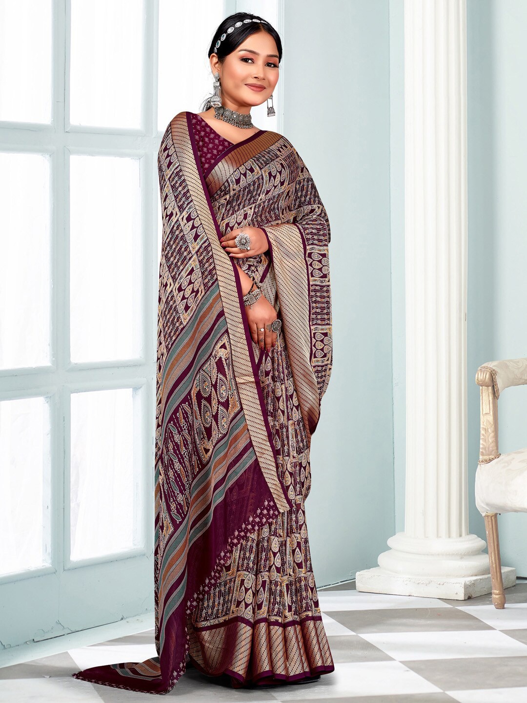 

Mitera Ethnic Motifs Woven Design Zari Pure Georgette Sungudi Saree, Magenta