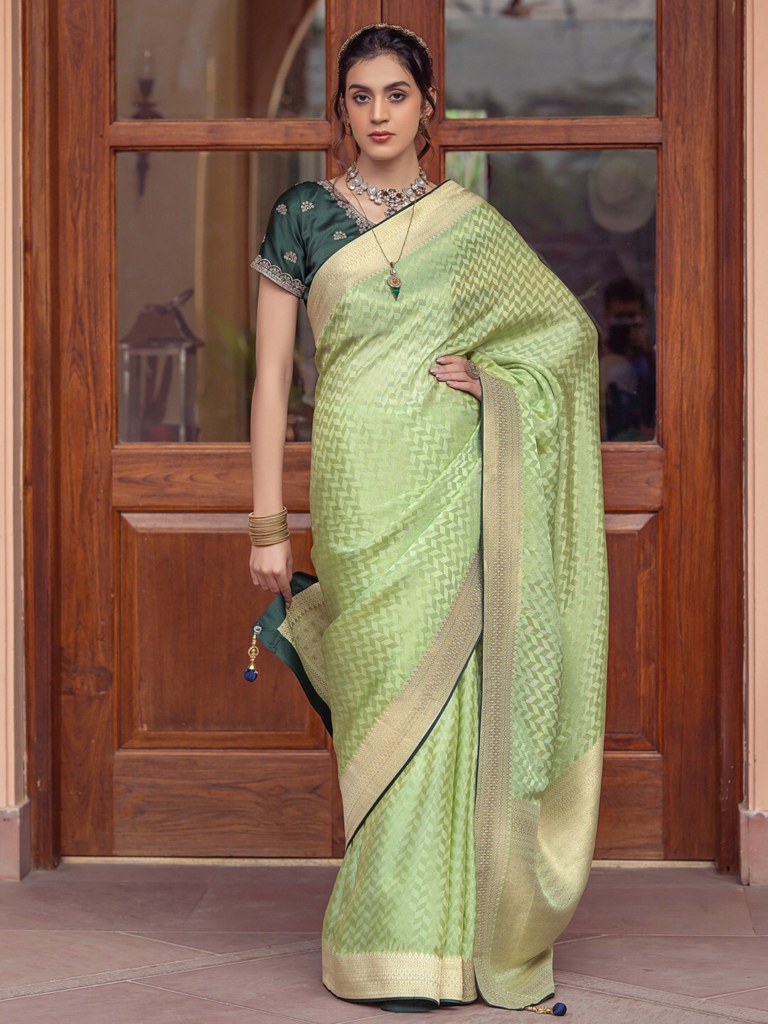 

Mitera Green & Gold toned Woven Design Zari Banarasi Saree