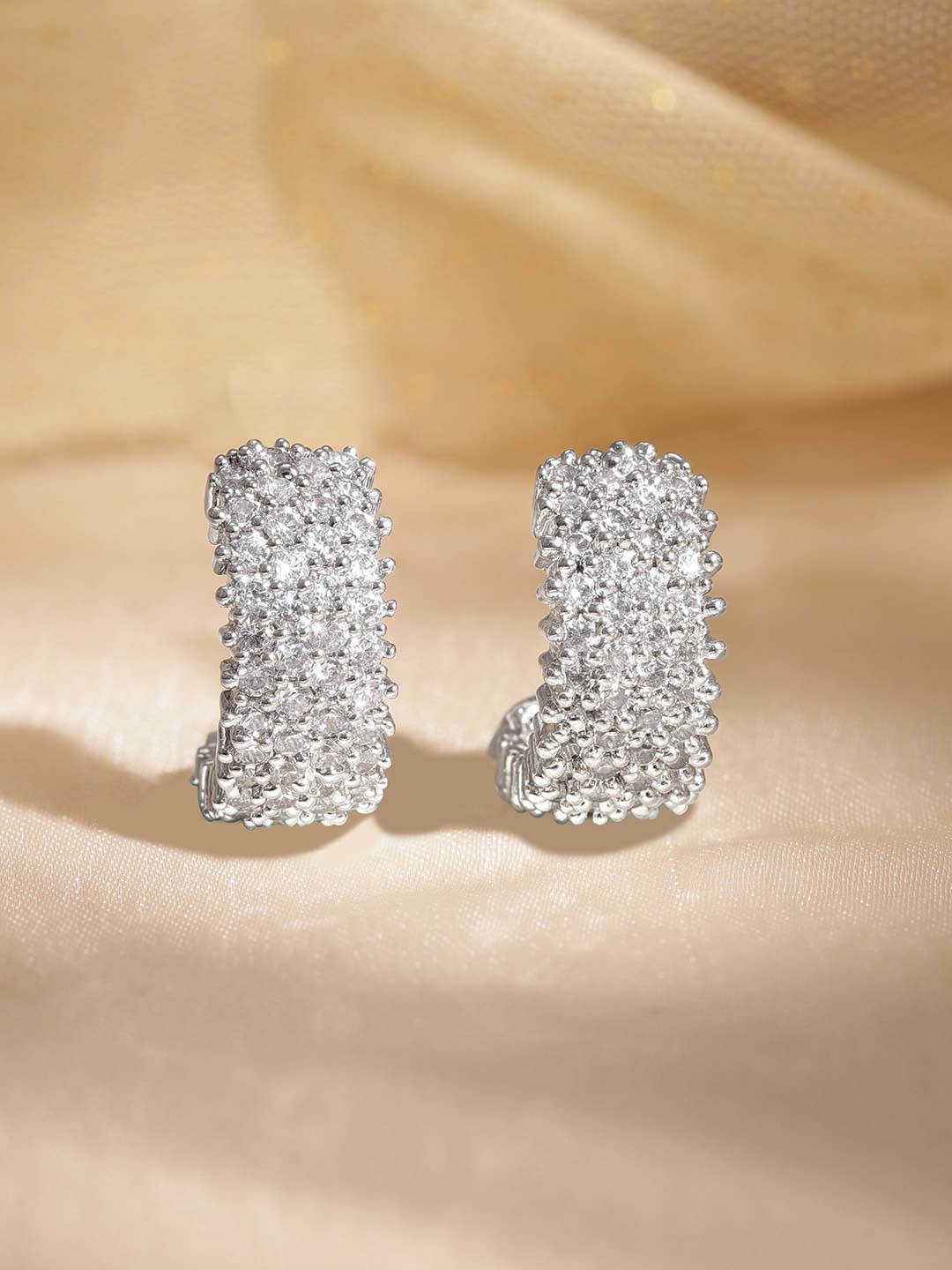 

Rubans Rhodium Plated American Diamond Studded Half Hoop Earrings, Silver