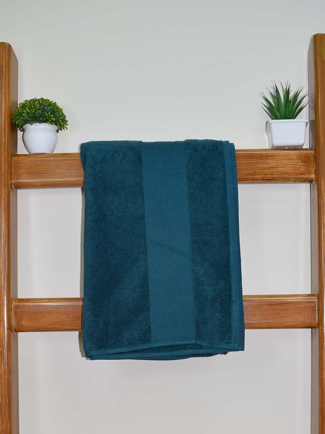 

Aura Teal 610 GSM Cotton Bath Towel