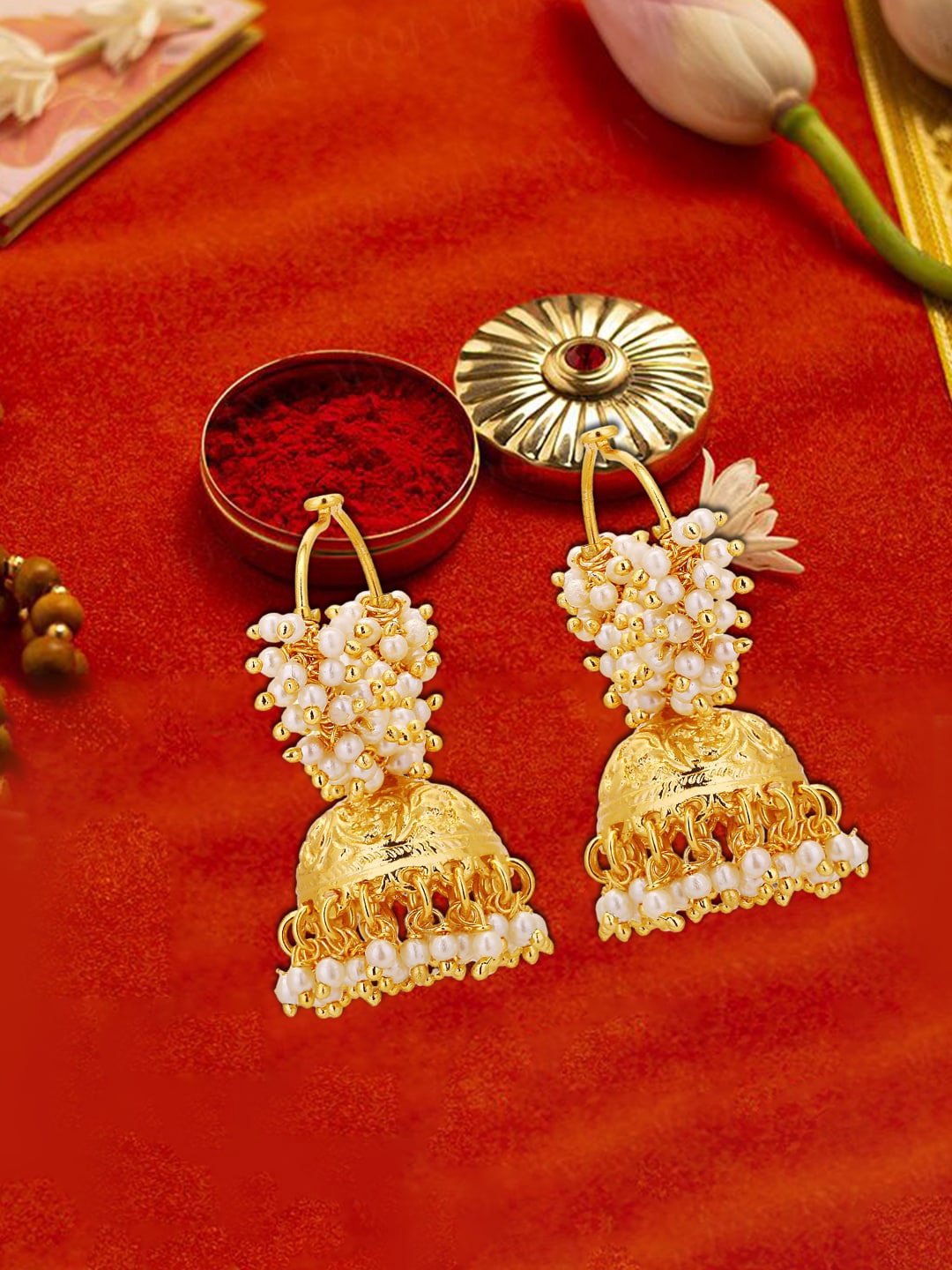

Anouk Gold-Plated Dome Shaped Jhumkas