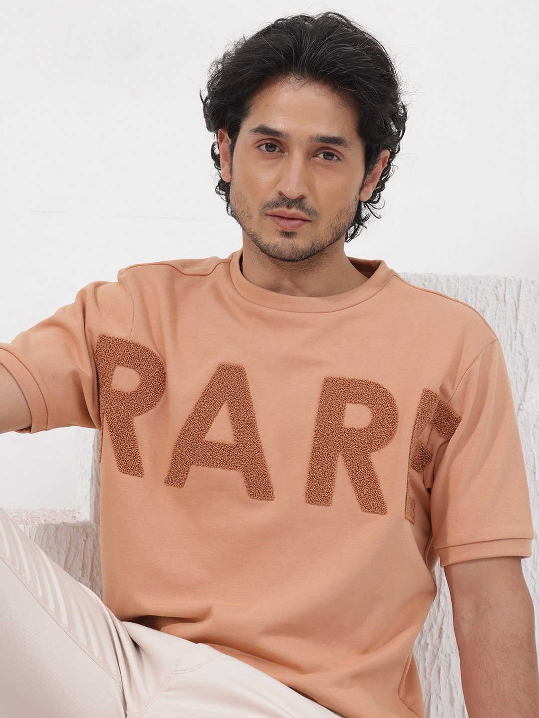 RARE RABBIT Men Nor-2 Typography Printed Oversized T-Shirt, Orange