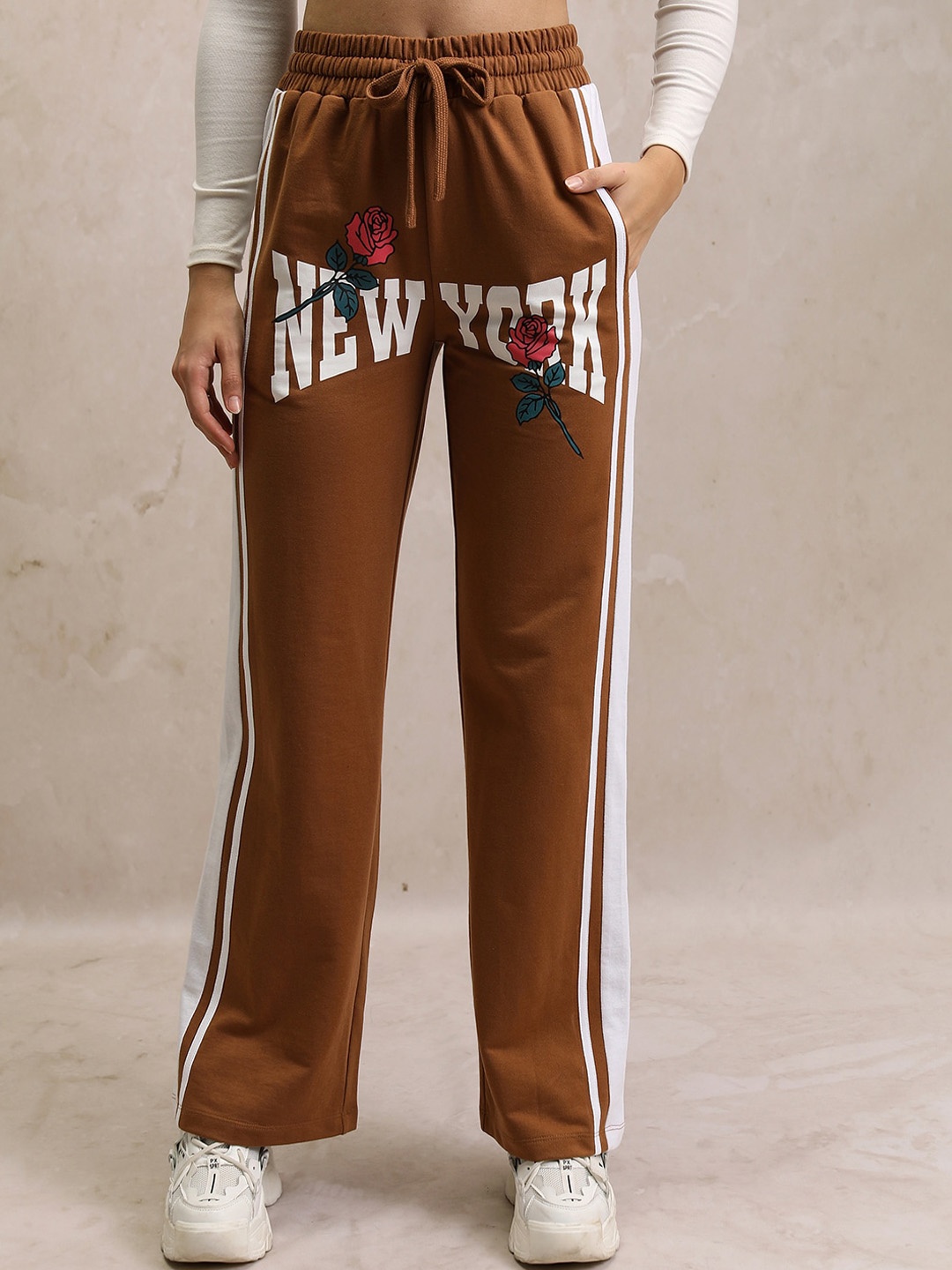 

Tokyo Talkies Women Brown Typography Printed Flared Bootcut Trouser