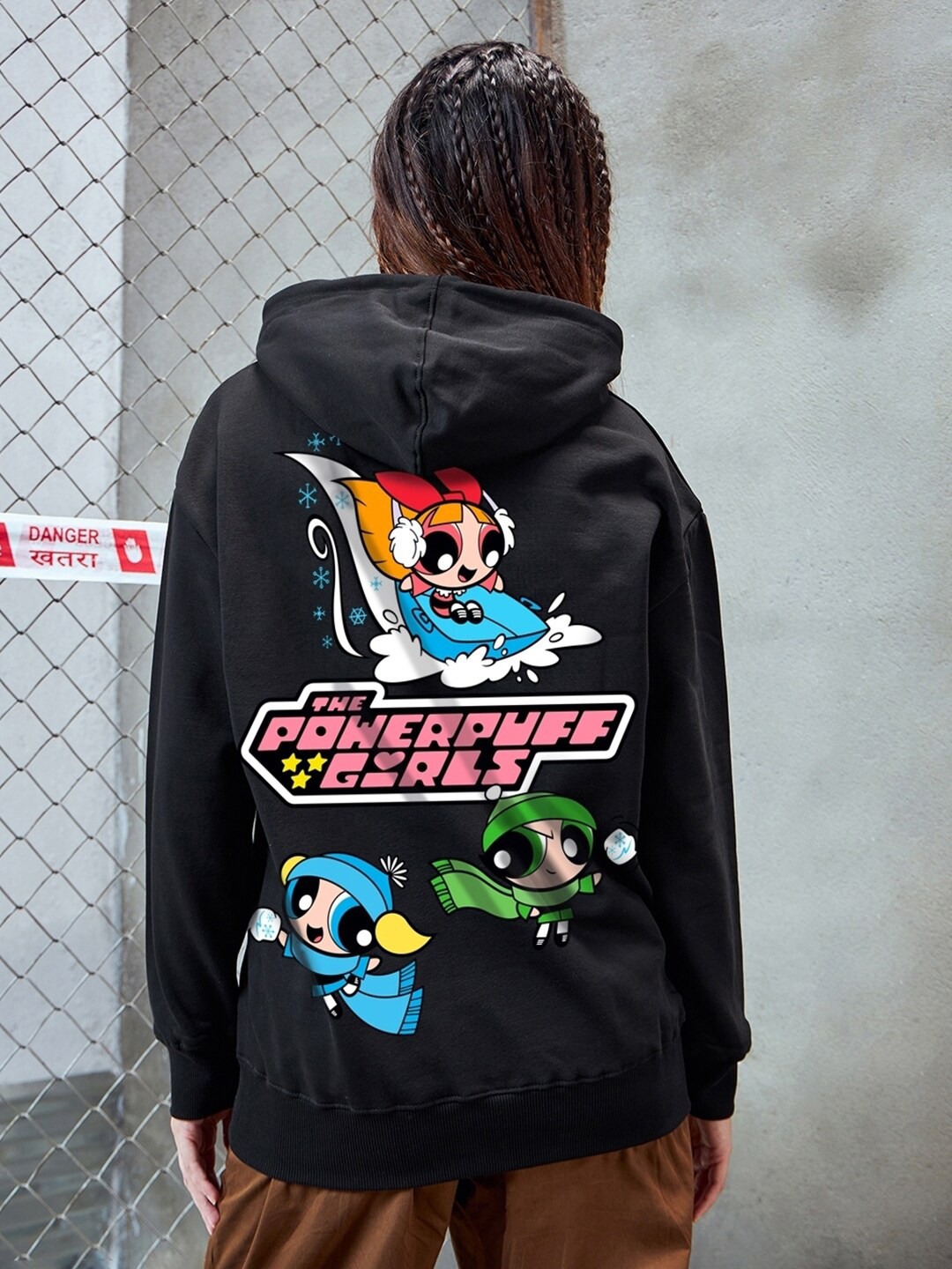 

Bewakoof Heavy Duty 1.0 Women Powerpuffed Christmas Graphic Printed Oversized Hoodies, Black
